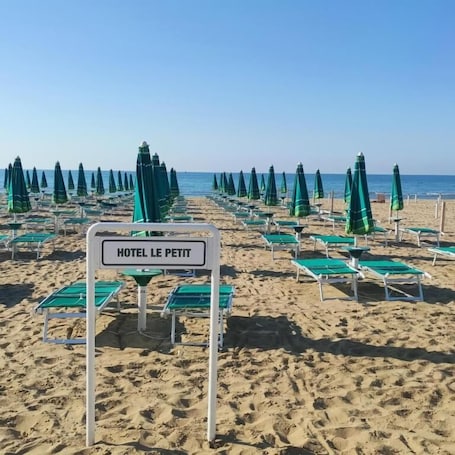 Private beach nearby, white sand, sun loungers, beach umbrellas