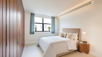 2 bedrooms, desk, iron/ironing board, travel crib