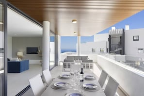 Outdoor dining - Exclusive 3-bedroom Apartment in Higueron (Fuengirola)