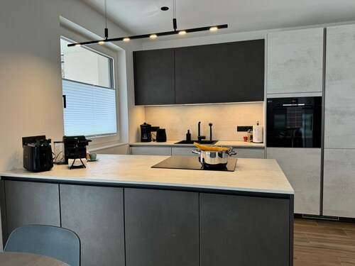 Modern apartment with large balcony. Near city center.