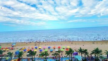 Private beach, beach umbrellas