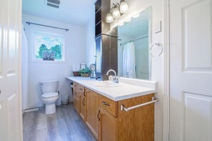 Shower, towels, toilet paper