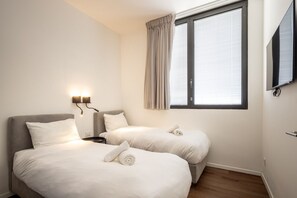 2 slaapkamers, een strijkplank/strijkijzer, gratis wifi