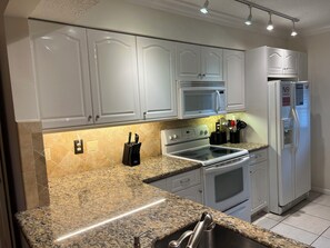 Fridge, microwave, oven, stovetop - Relax and Unwind in This Charming Pompano Beach Condo, 2BR/2BR (Pompano Beach)