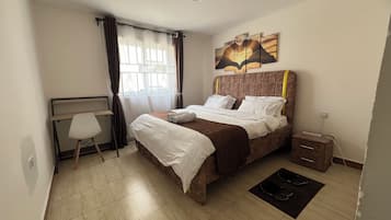 2 dormitorios, tabla de planchar con plancha, wifi y ropa de cama