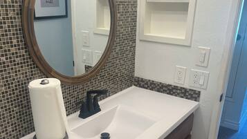 Hair dryer, towels, soap, shampoo