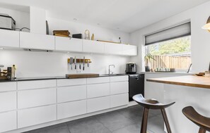 Fridge, microwave, dishwasher, coffee/tea maker