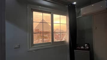 Luxury Twin Room, Pyramids View | Minibar, desk, iron/ironing board, free WiFi