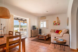 TV, fireplace - Villa 'Torre Xanchu' with Mountain View, Wi-Fi and Air Conditioning (Sant Josep de sa Talaia)