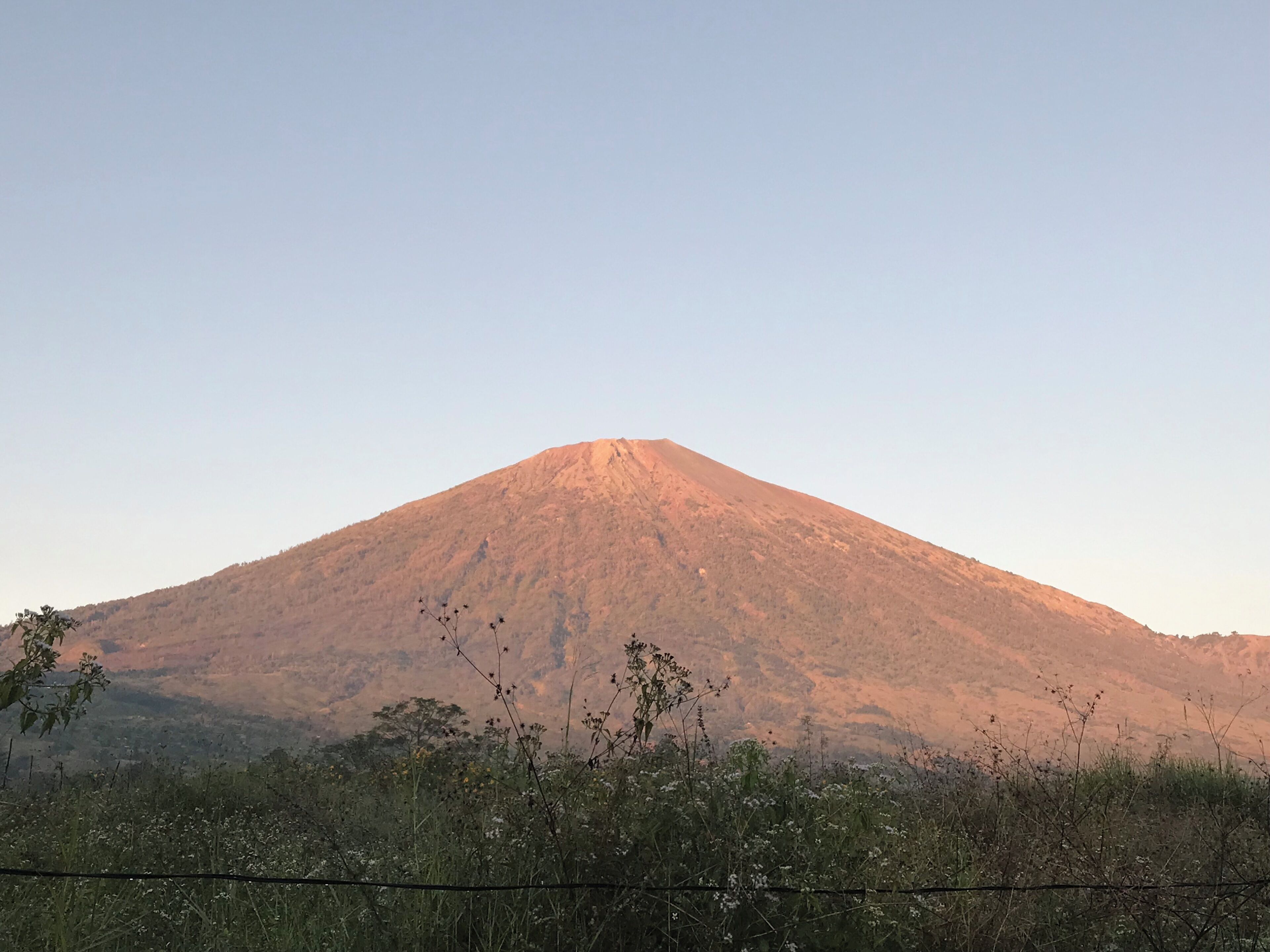 A mountain with a clear sky.