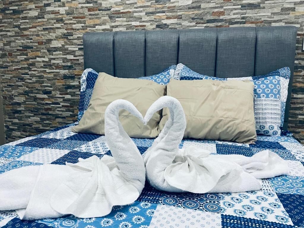 Egyptian cotton sheets, premium bedding, down duvets, Tempur-Pedic beds