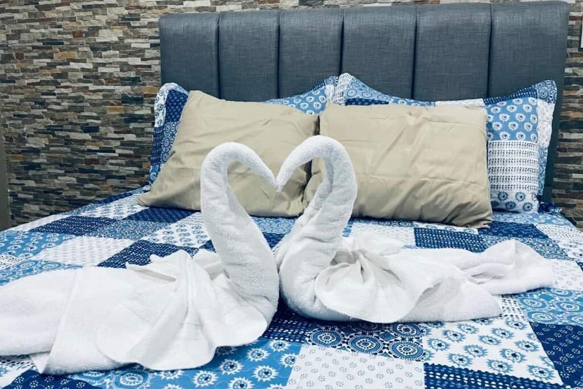 Egyptian cotton sheets, premium bedding, down duvets, Tempur-Pedic beds