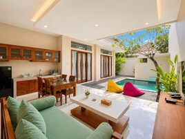 Oasis Two bedroom Villa | Living area | Smart TV