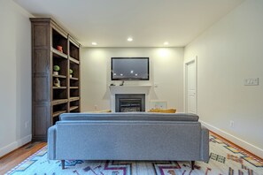 Smart TV, fireplace, table tennis, books