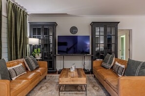 Smart TV, fireplace, table tennis, books