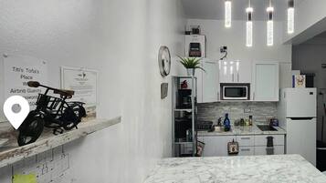 Fridge, microwave, coffee/tea maker, toaster