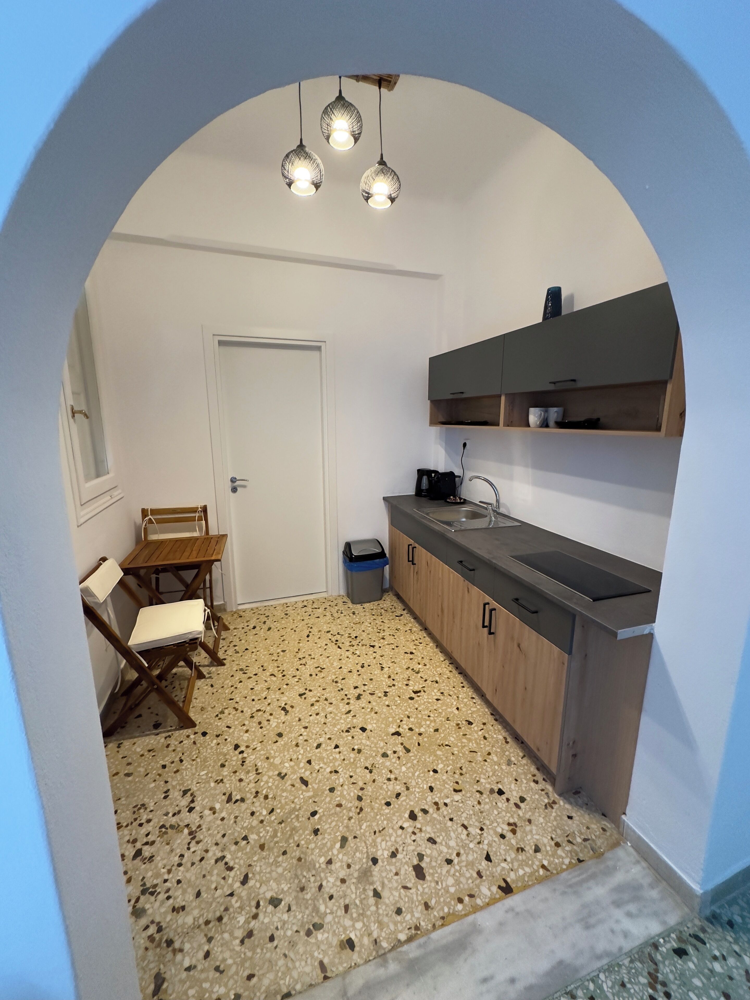 Fridge, coffee/tea maker, cookware/dishes/utensils, dining tables