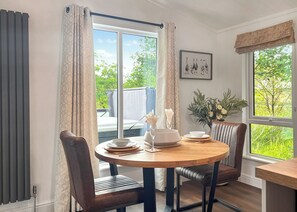 Dining - Escape to a luxurious one-bedroom lodge designed exclusively for couples. (Chipping)