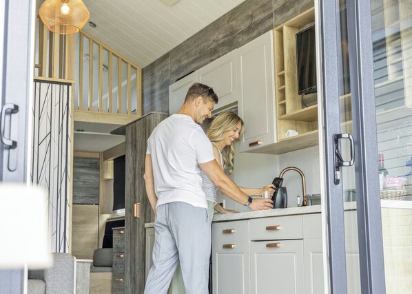 Fridge, toaster, cookware/dishes/utensils