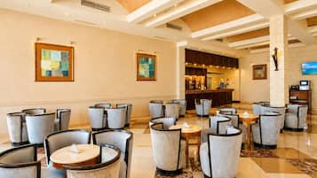 8 bars/lounges, 2 swim-up bars, 2 poolside bars, beach bar