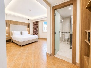 Habitació familiar | Roba de llit d'alta qualitat i minibar gratuït 