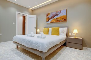 4 slaapkamers, een strijkplank/strijkijzer, beddengoed