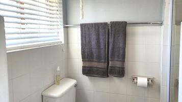 Basic Apartment, Courtyard View | Bathroom | Towels, toilet paper