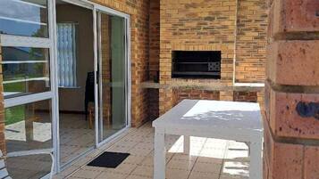 Family Apartment, Patio, Garden View | Terrace/patio