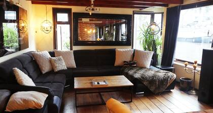 Beautiful Houseboat on Canals of Amsterdam City Center