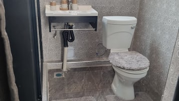 Hair dryer, towels, soap, shampoo