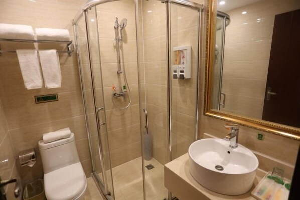 A modern bathroom with a glass-enclosed shower, a toilet, and a sink with a mirror. - Vienna Classic Hotel (Xi'an Railway Station North Square Anyuanmen Metro Station) (Xi'an)