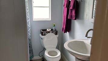 Shower, towels, soap, shampoo