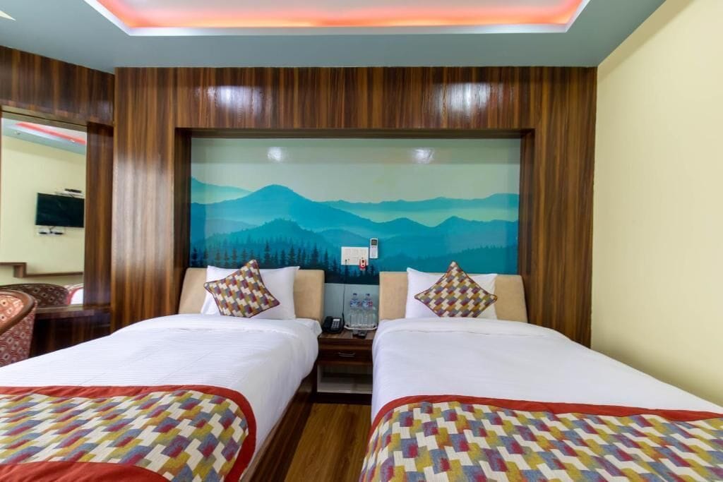 Deluxe kamer, 1 twee- of 2 eenpersoonsbedden | Beddengoed