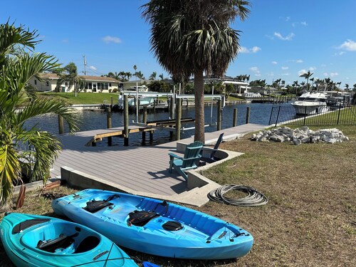 Waterfront Relaxation: Gulf access home with heated pool & spa, dock, and kayak