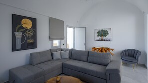 Coral Villa with Sea View & Hot Tub | Living area | 32-inch Smart TV with satellite channels - Marvarit Villas (Santorini)