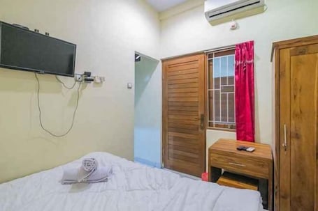 Quarto. Maharani Guest House RedPartner @ Gatot Subroto Timur Denpasar