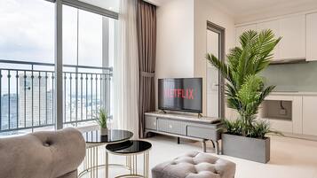 Royal Apartment, 3 Bedrooms, Balcony, City View | Living area | 40-inch TV with cable channels