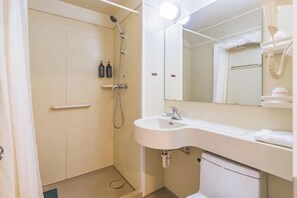 A bathroom with a shower, sink, mirror, and towel rack. - Winterless Hotel (Beijing XiDiaoyutai Subway Station branch) (Beijing)