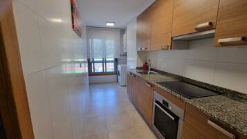 Apartment | Private kitchen | Fridge, microwave, oven, stovetop
