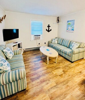 Living area - Water view • cozy & quiet 2-BR cottage (Chincoteague)