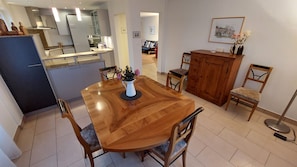 Enjoy dining and socializing in this well-appointed space with a large table and comfortable seating for six.