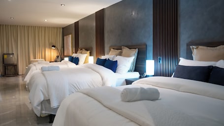 Luxury Suite, Pool View | Desk, laptop workspace, free WiFi, bed sheets