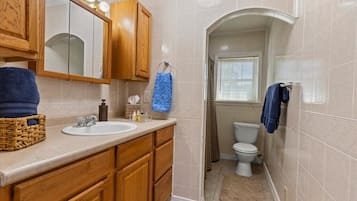 Hair dryer, towels, soap, shampoo