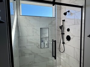 Jetted tub, hair dryer, towels, soap