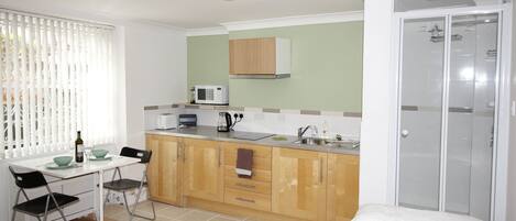 Microwave, stovetop, electric kettle, toaster