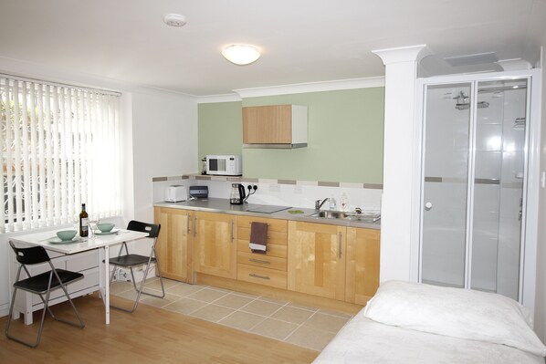 Microwave, stovetop, electric kettle, toaster