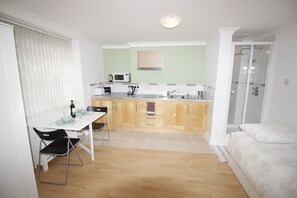 Microwave, stovetop, electric kettle, toaster