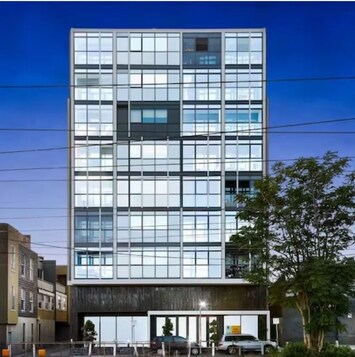 FRONT: One Railway Place is a modern apartment block with a roof top terrace with outdoor dining area and barbecue that is perfect for relaxing and entertaining in the bustling heart of inner city Richmond.