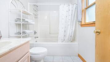 Hair dryer, bidet, towels, soap
