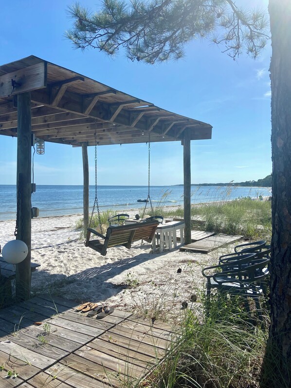 On the beach, sun loungers, beach towels